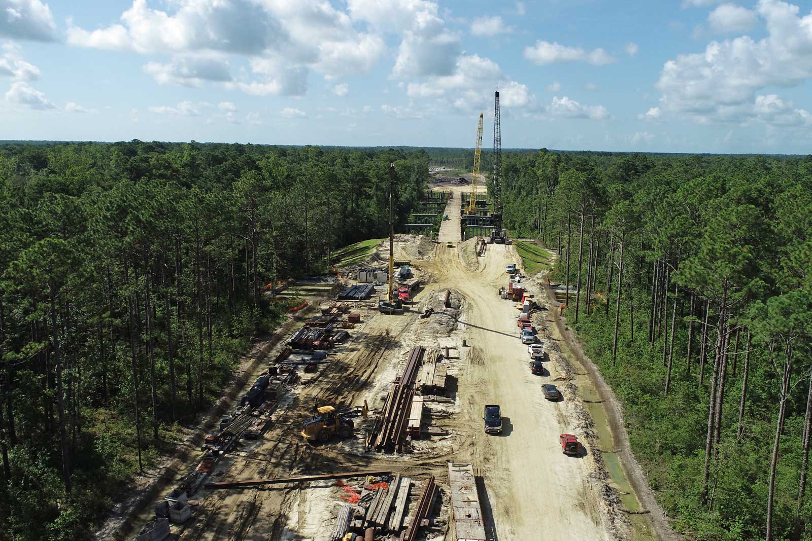 Construction of the dual bridges over the southwest prong of Slocum Creek.